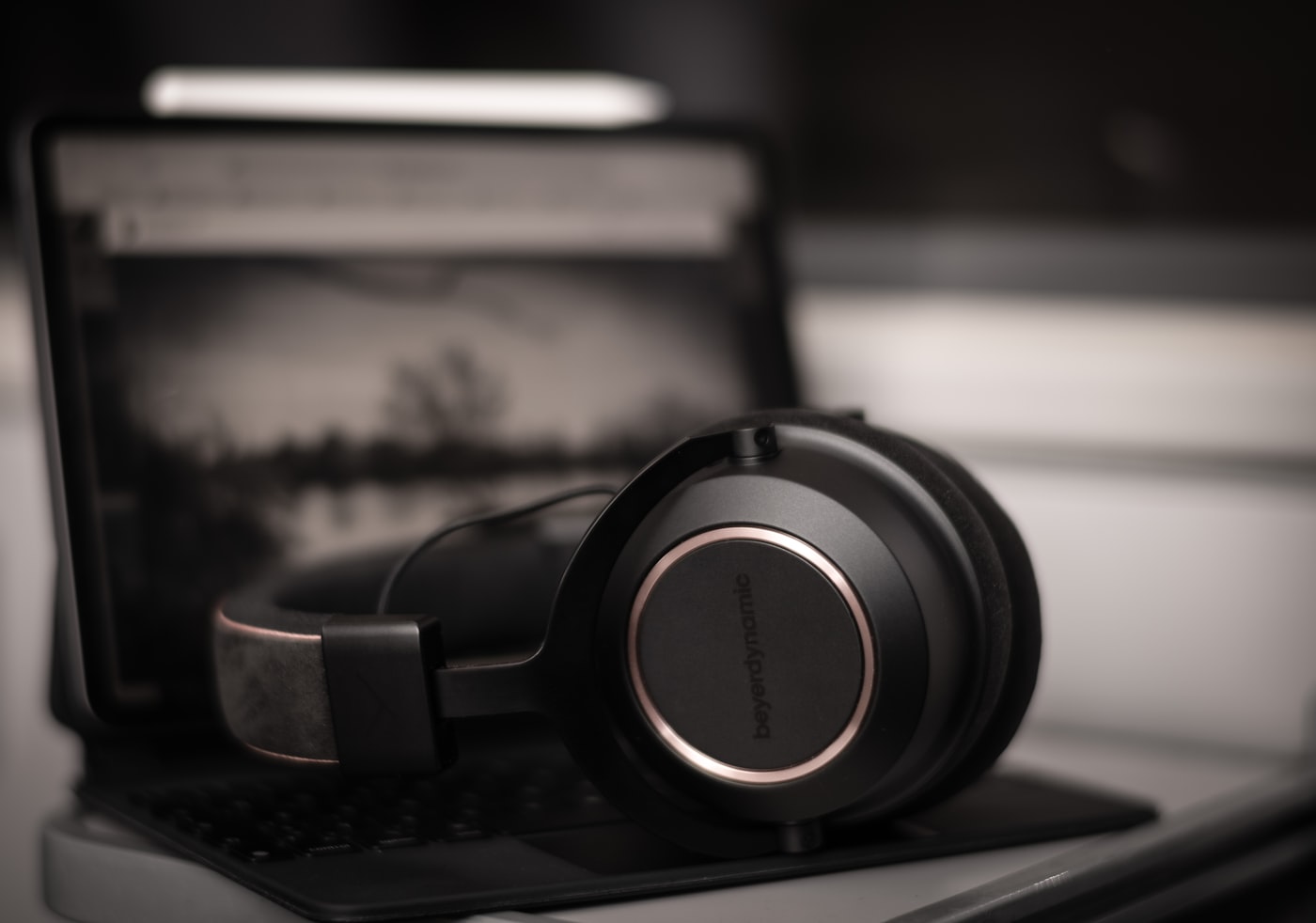 Headphones on a laptop for converting SoundCloud to MP3